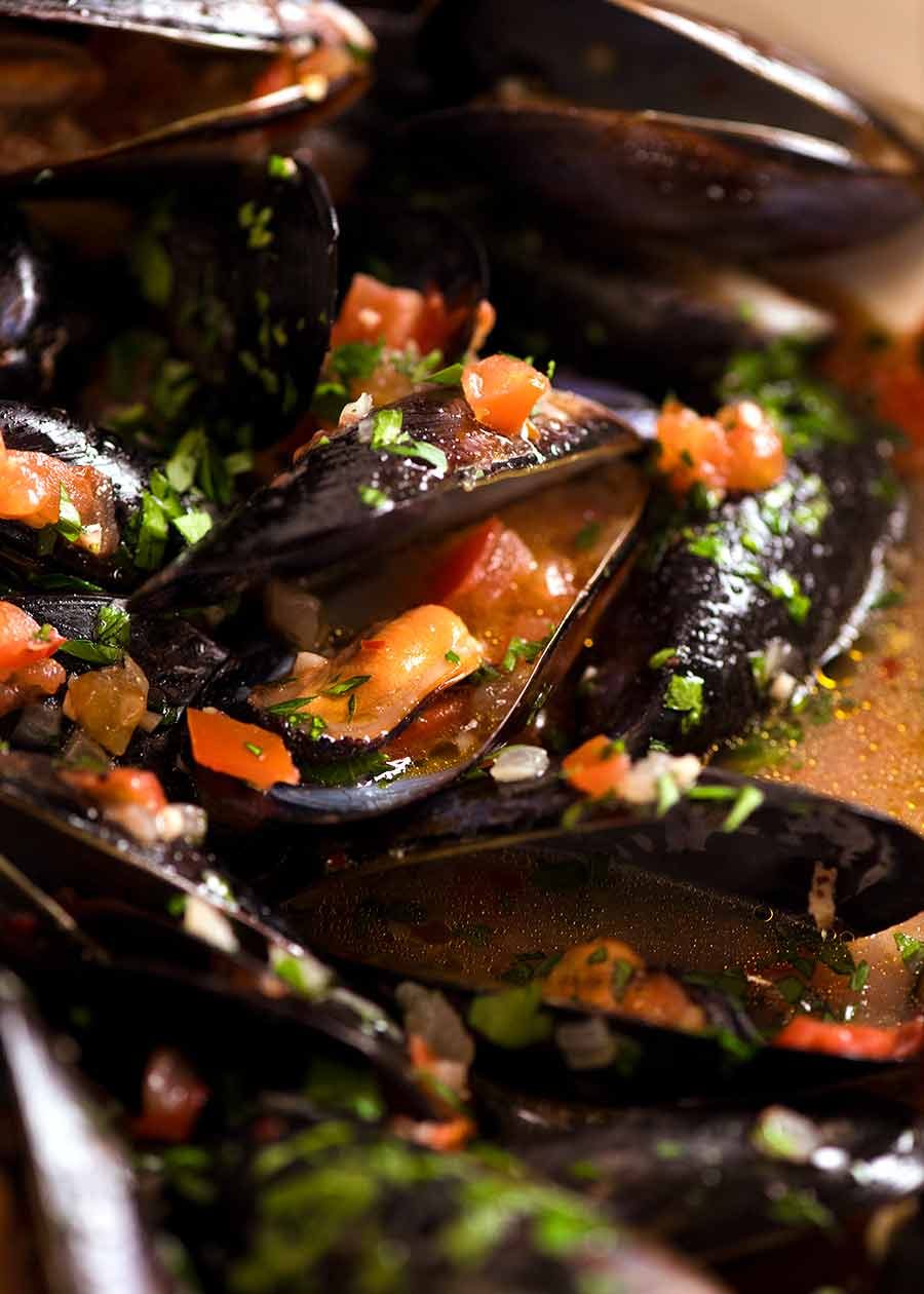 Close up of mussels with garlic white wine