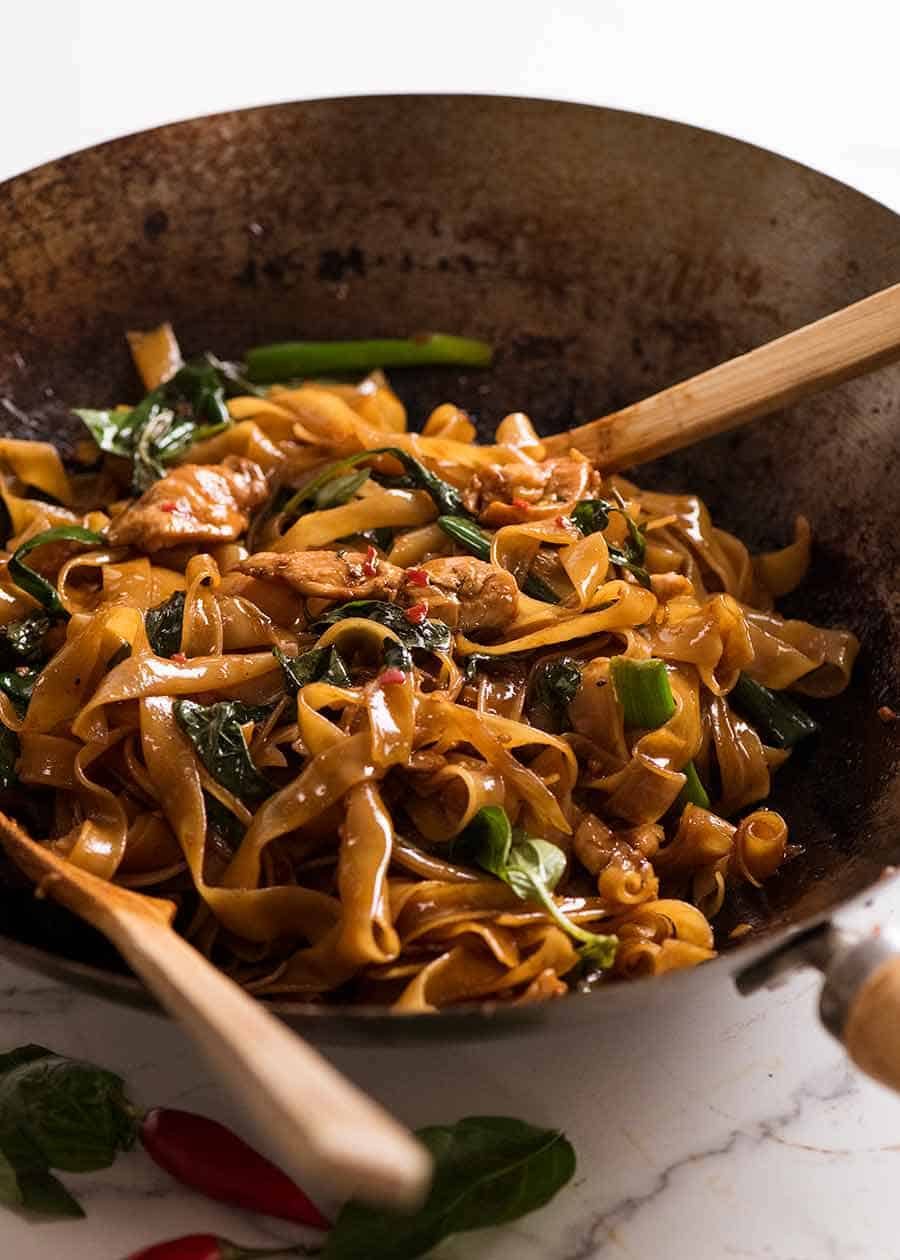 Thai Drunken Noodles in a wok, fresh off the stove