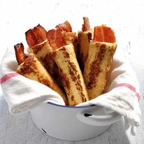 Bacon French Toast Roll Ups - crispy bacon rolled up in bread, dipped in egg mixture and pan fried golden brown. These need to be made with fresh, plain sandwich bread, not fancy artisan bread. #breakfast #brunch #french_toast #bacon #roll_up