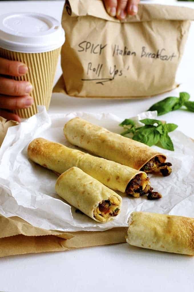 Spicy Italian Breakfast Roll Ups and paper takeaway bag