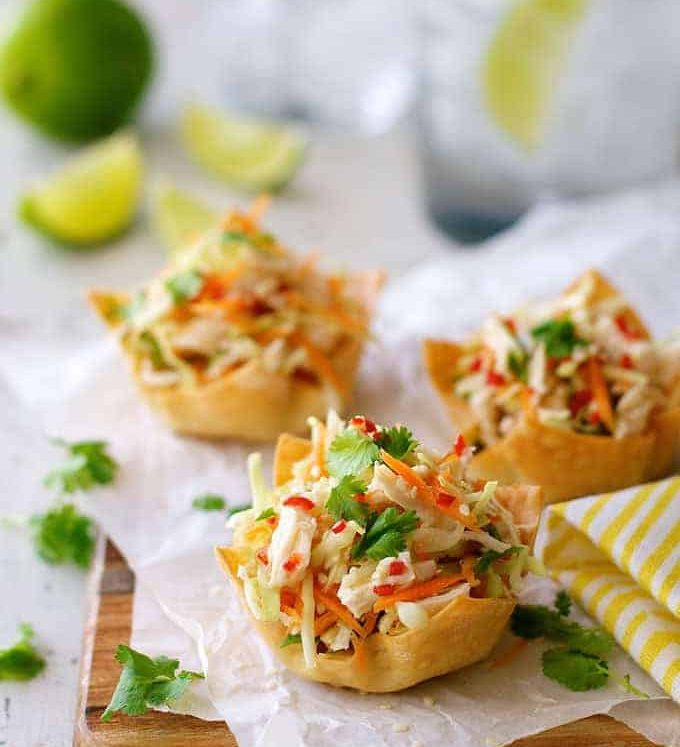 A serving board of Thai Chicken Salad Wonton Cups