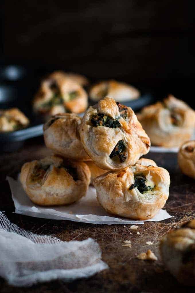 A pile of Ricotta and Spinach Puff Pastry Bites