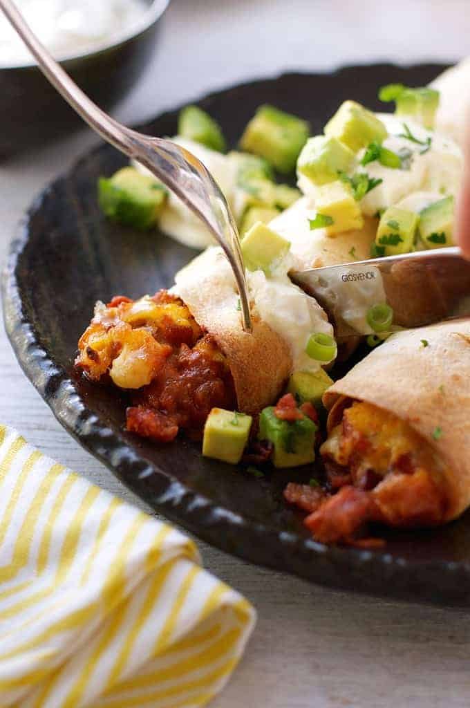 Cutting in to Bacon and Egg Breakfast Enchiladas