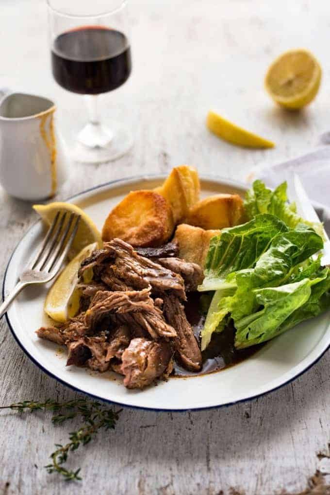 Slow Roasted GREEK Leg of Lamb - Tender fall apart lamb made the Greek way! Super easy.