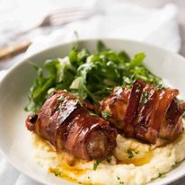Bacon Wrapped Chicken - A spectacular way to dress up chicken with just a few simple ingredients! Brown sugar is the key to creating a gorgeous glaze on the bacon. recipetineats.com