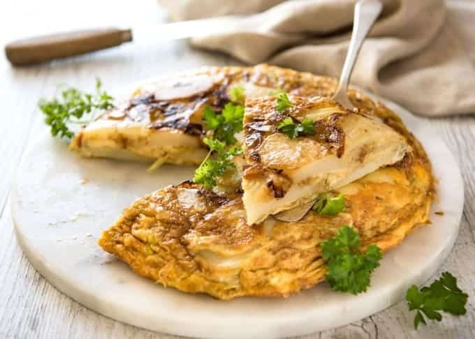 Spanish Tortilla (Omelette) - One of the best omelettes in the world, made with just eggs, potatoes, onion and olive oil! recipetineats.com
