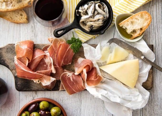 5 Easy Spanish Tapas recipes - all your favorites from the tapas bar! Garlic mushrooms, chorizo, garlic shrimp/prawns, Spanish marinated olives , Spanish omelette and a cheese platter! www.recipetineats.com