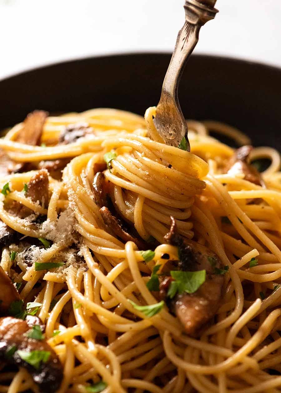 Fork twirling mushroom pasta