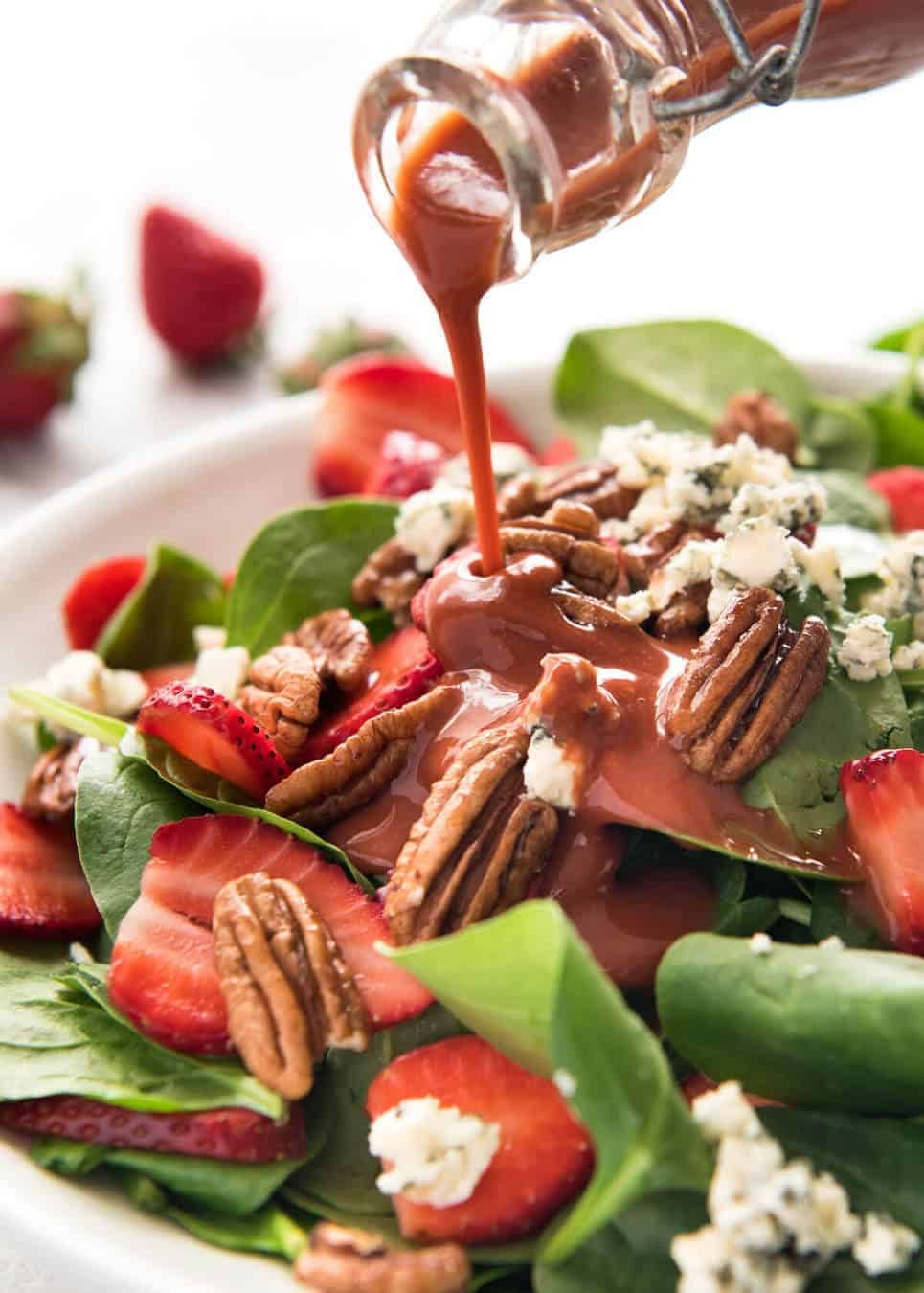 A stunning Chef recipe for a Strawberry Spinach Salad. Spinach, fresh strawberries, blue cheese and candied pecans with a Strawberry Balsamic Dressing. recipetineats.com