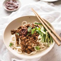 Chinese Pork with Noodles (Zha Jiang Mian) - Super quick and super tasty, affectionally known as "Chinese Bolognese". The pork is savoury with a touch of heat and spice, perfect mixed through noodles! www.recipetineats.com