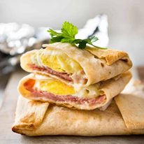 No Washing Up Ham Egg Cheese Pockets - Place ham on a wrap/tortilla, top with a ring of shredded cheese, crack an egg inside, wrap with foil and bake. Voila! A hot breakfast pocket! www.recipetineats.com