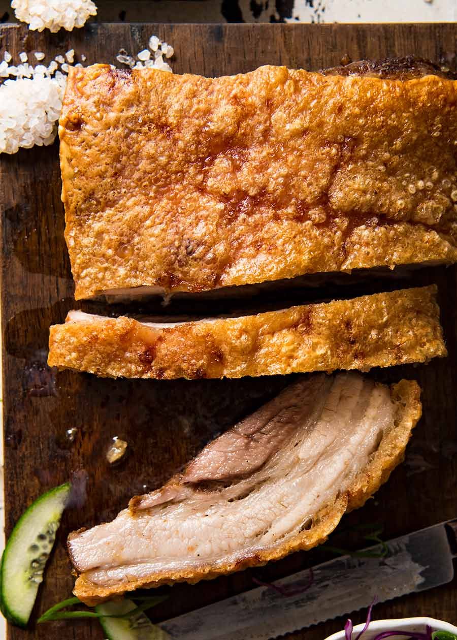 Overhead photo of Chinese Crispy Pork Belly with some slices cut