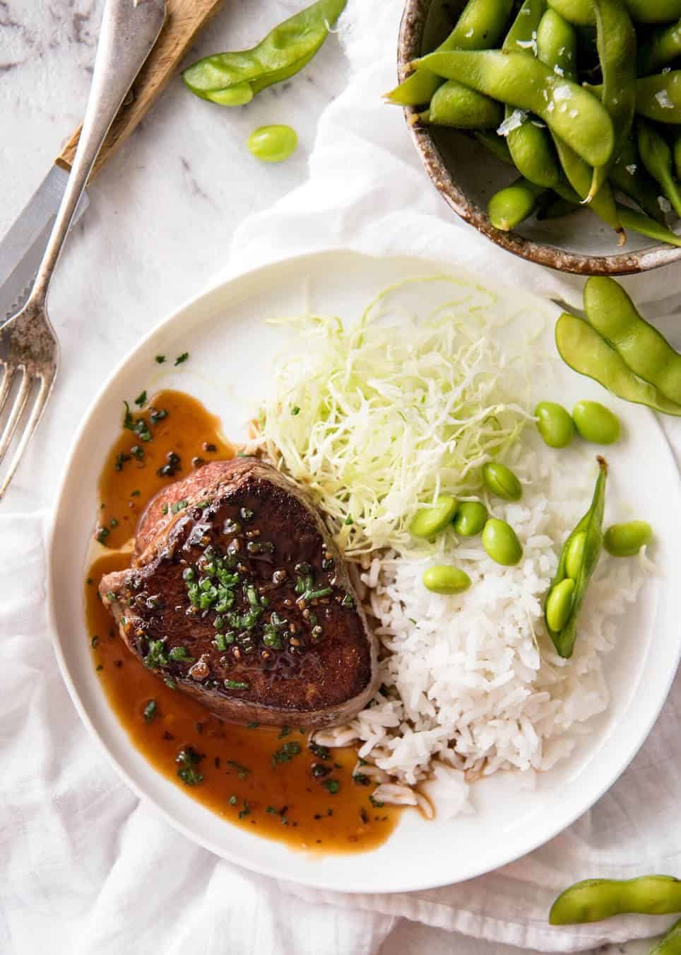 Simple yet stunning Asian Steak with a sauce inspired by the great Tetsuya! All you need is 15 minutes, soy sauce, mirin, sake or sherry, butter, garlic and ginger. Amazing! www.recipetineats.com