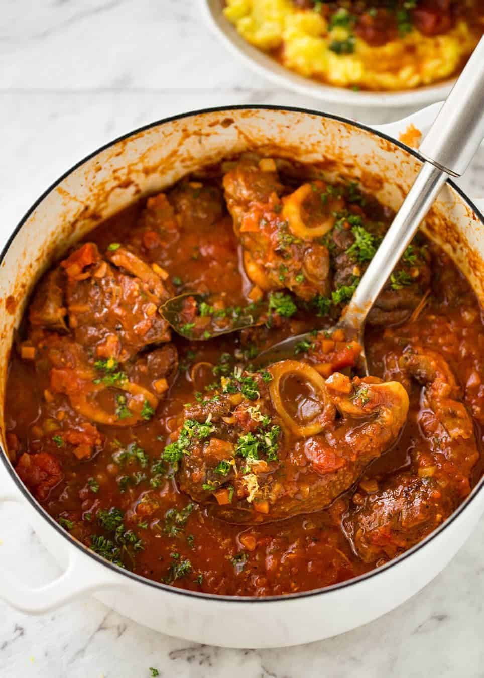 Fork tender veal braised in a rich red sauce, Osso Buco is a meal fit for a king! www.recipetineats.com