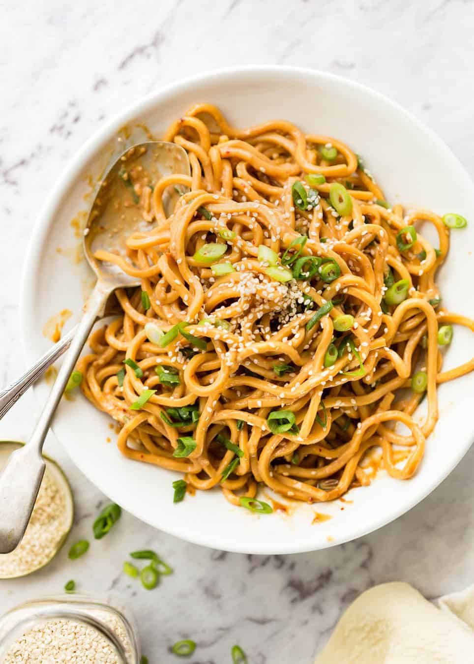 Sesame Noodles - noodles tossed with a wicked Asian Sesame Peanut Dressing. Serve these as Cold Sesame Noodles or warm. www.recipetineats.com