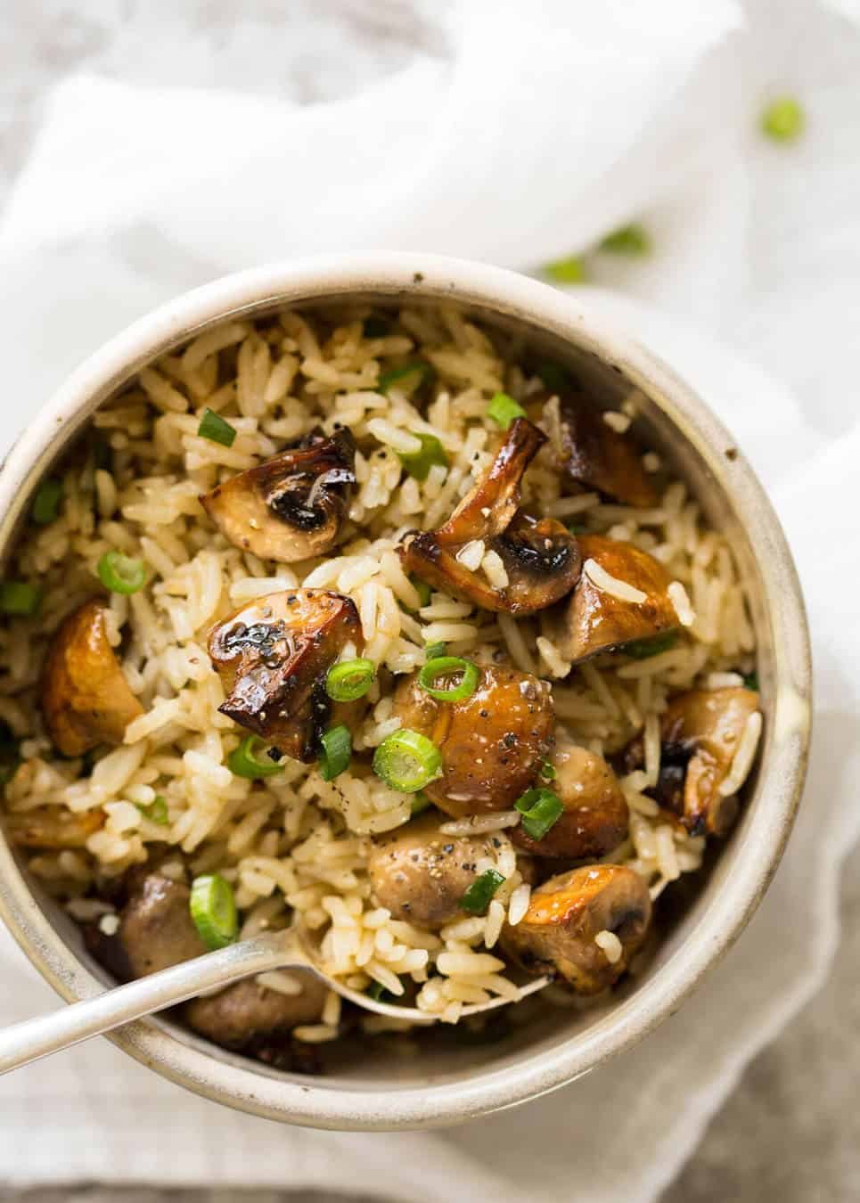 Baked Mushroom Rice - buttery, garlicky, golden brown juicy mushrooms and fluffy rice, all baked in one pan! recipetineats.com