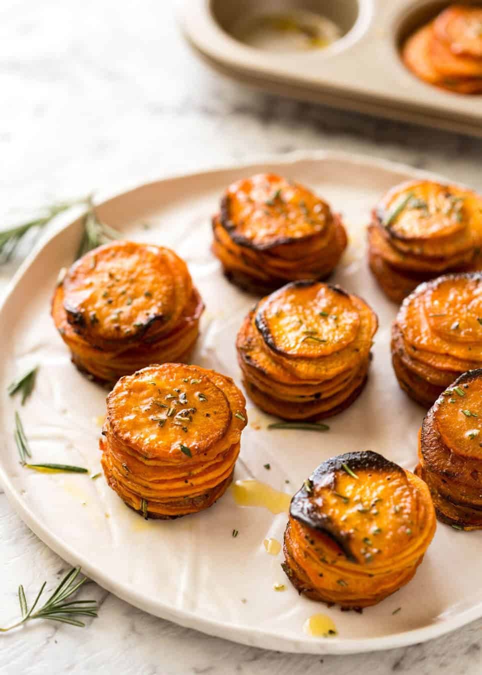 These Roasted Sweet Potato Stacks have crispy edges, are buttery, salty and sweet with a hint of rosemary. Terrific Sweet Potato side dish! recipetineats.com