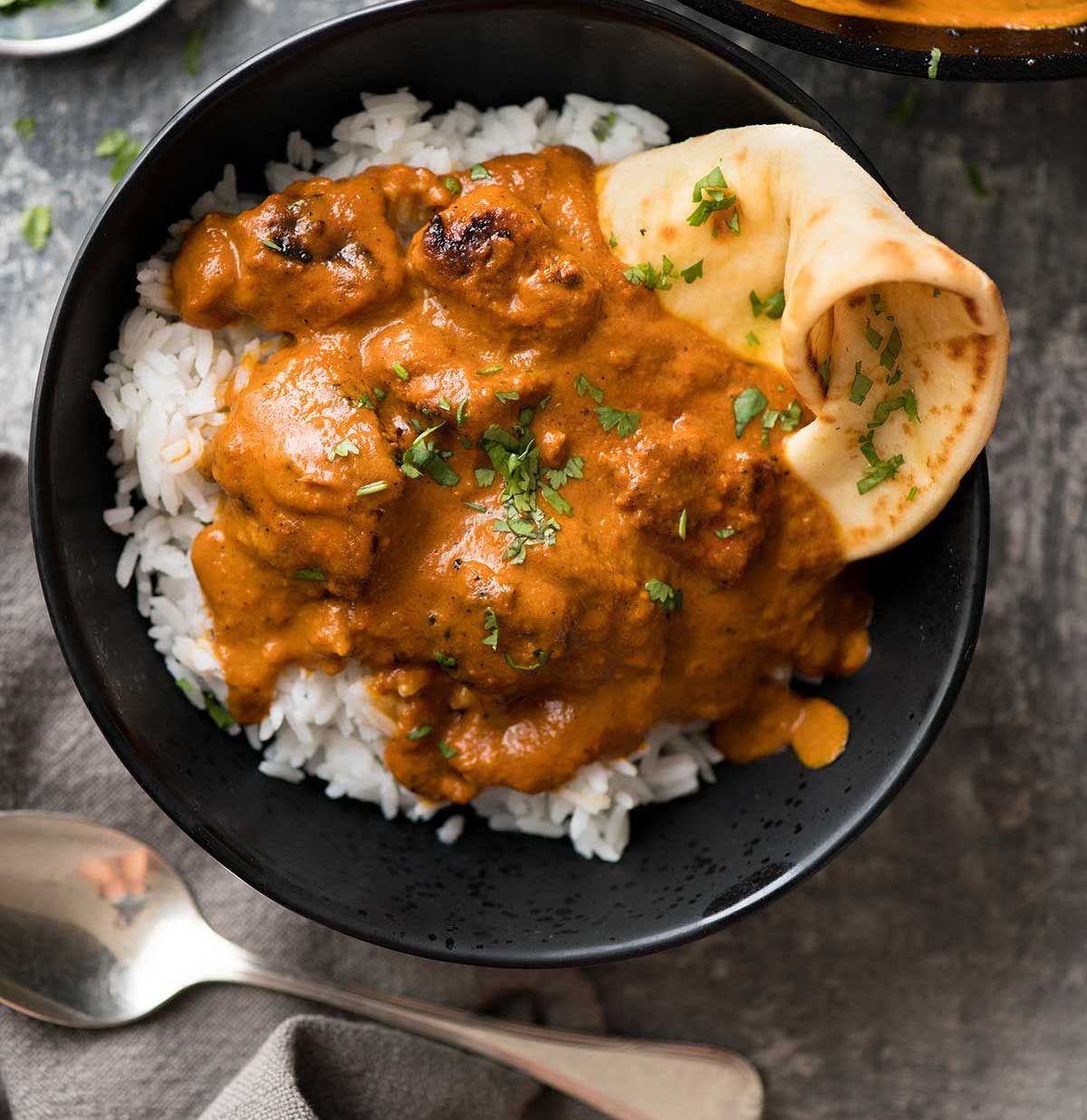 Chicken Masala served with basmati rice and naan