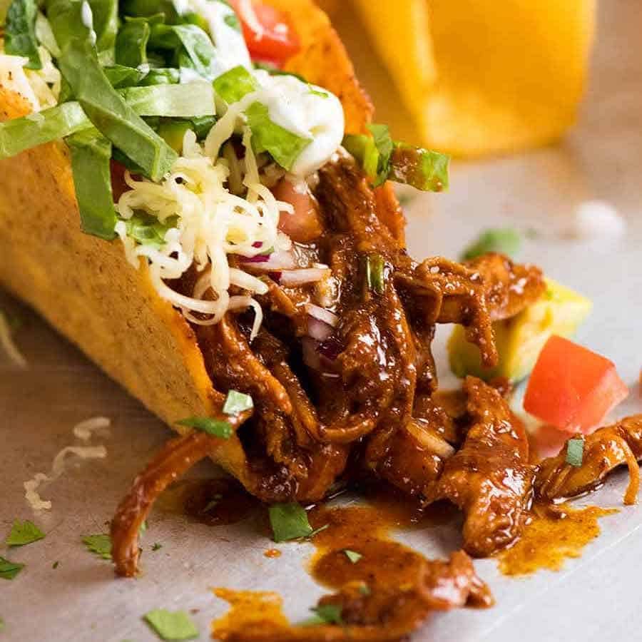 Juicy quick chicken taco filling inside crispy taco shells