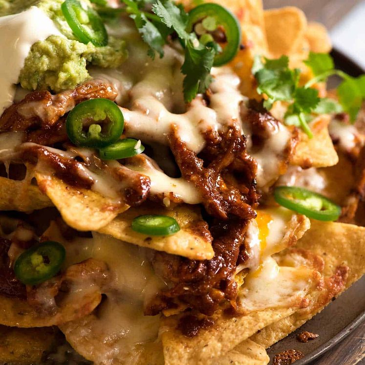 Close up of Chicken Nachos made tin Doritos corn chips