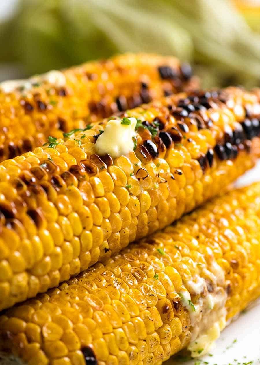 How to grill corn - Stack of Grilled Corn with melting butter