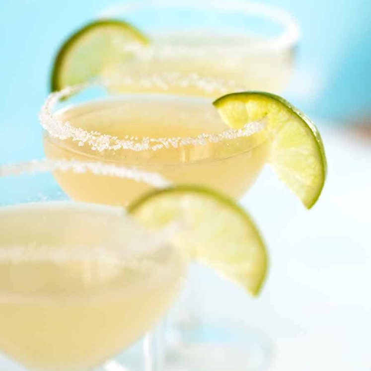 3 Margaritas with salt rim and lime slice