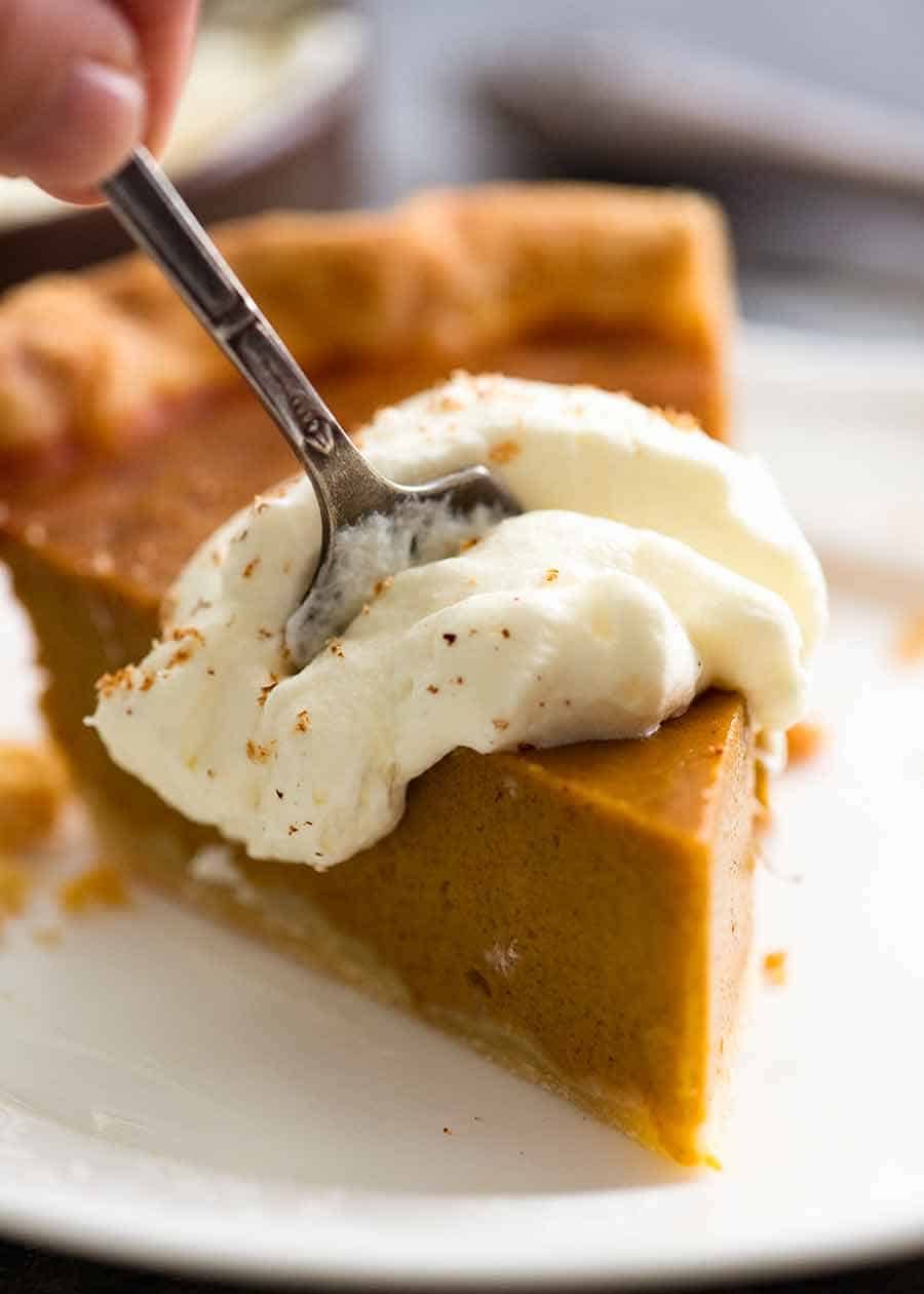 Fork cutting into Pumpkin Pie