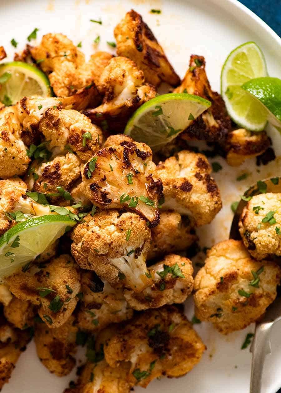 Pile of roasted cauliflower on a plate, ready to be served