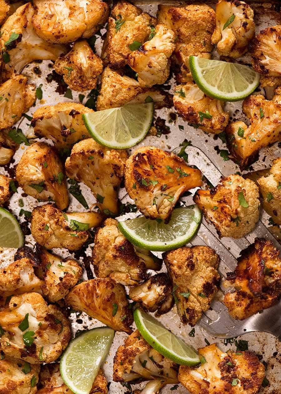 Tray of roasted cot be served.auliflower, ready