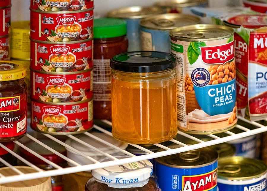 Ghee and Clarified Butter in a jar in the pantry