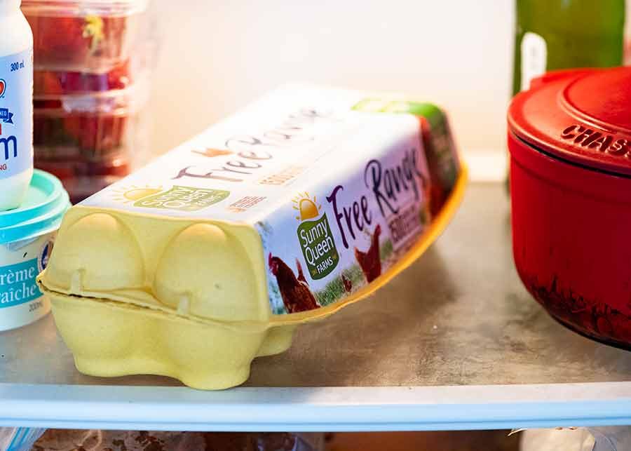 Photo of carton of eggs in fridge