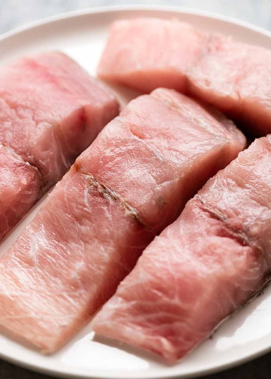 Plate with Raw barramundi fillets