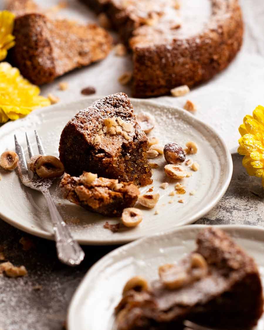 Olive oil hazelnut cake on a plate ready to be eaten
