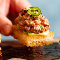 Picking up Spicy tuna crispy rice