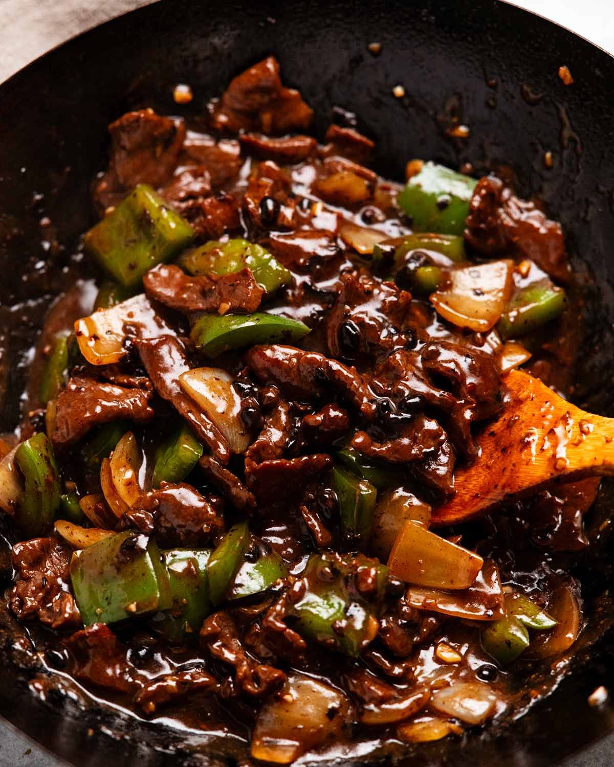 Beef in black bean sauce in a wok